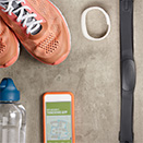 Exercise shoes, heart rate monitor and app on phone