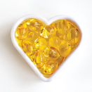 omega-3 capsules in heart shaped dish