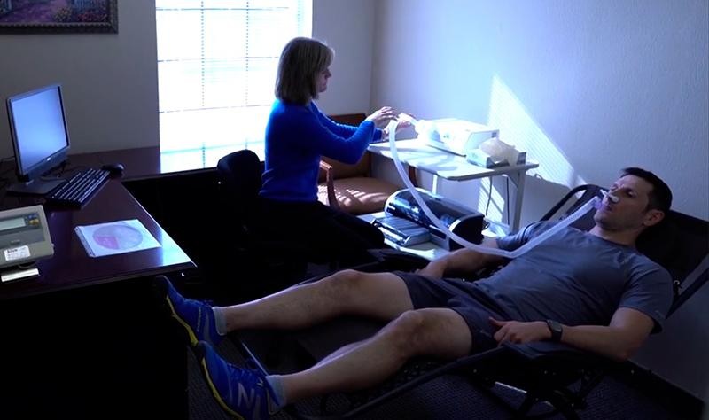 Female specialist is massaging with vacuum to belly of client for anti-fat in estetic clinic.