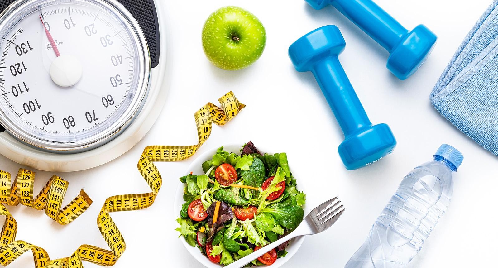 Great Weight Loss Results image of a healthy salad, water bottle and measuring tape.