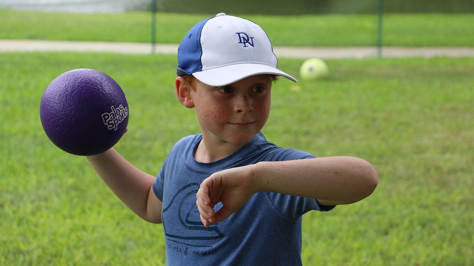 Sports Training - Boy playing tennis at Cooper Fitness Center
