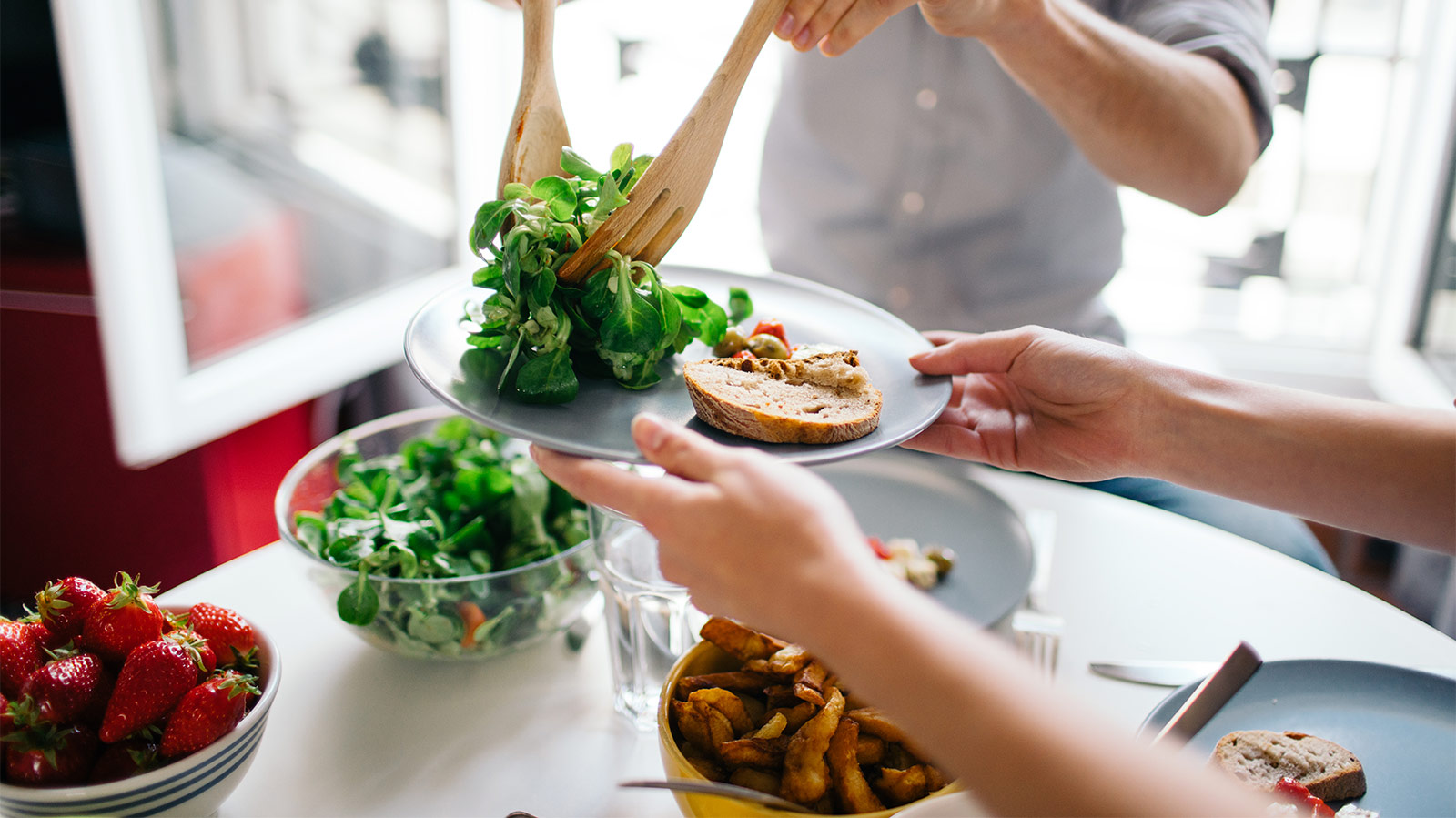 A person serving healthy diet