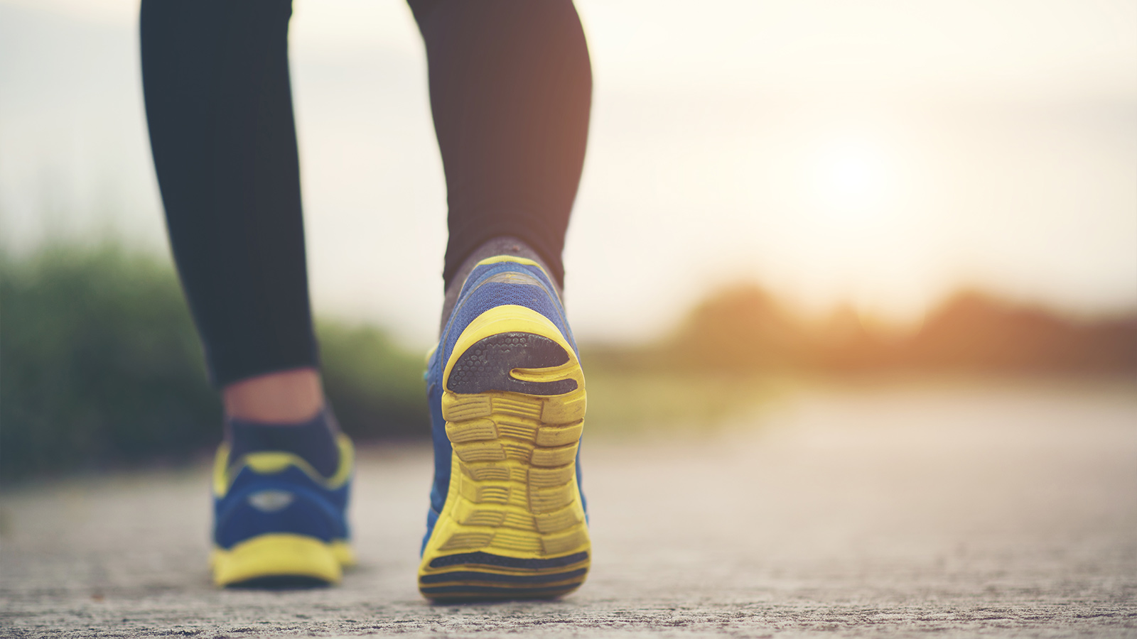 Close up on running shoes Fitness women training and jogging