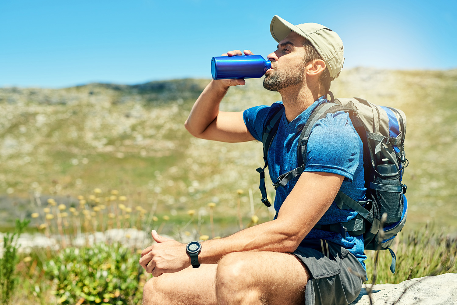 Man Hiking Drinking Water
