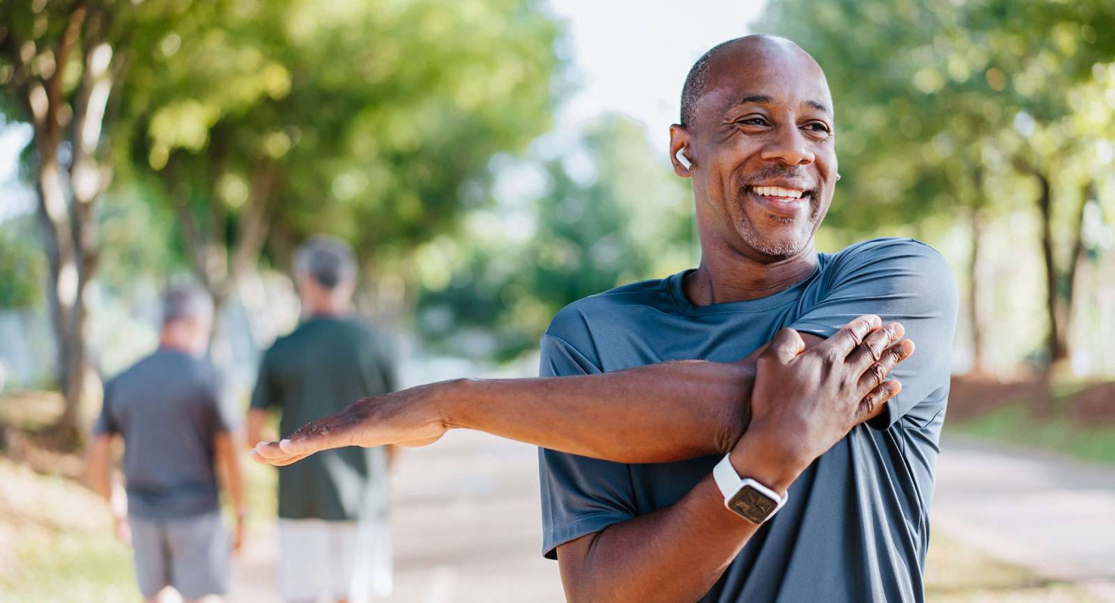Man stretching his arm