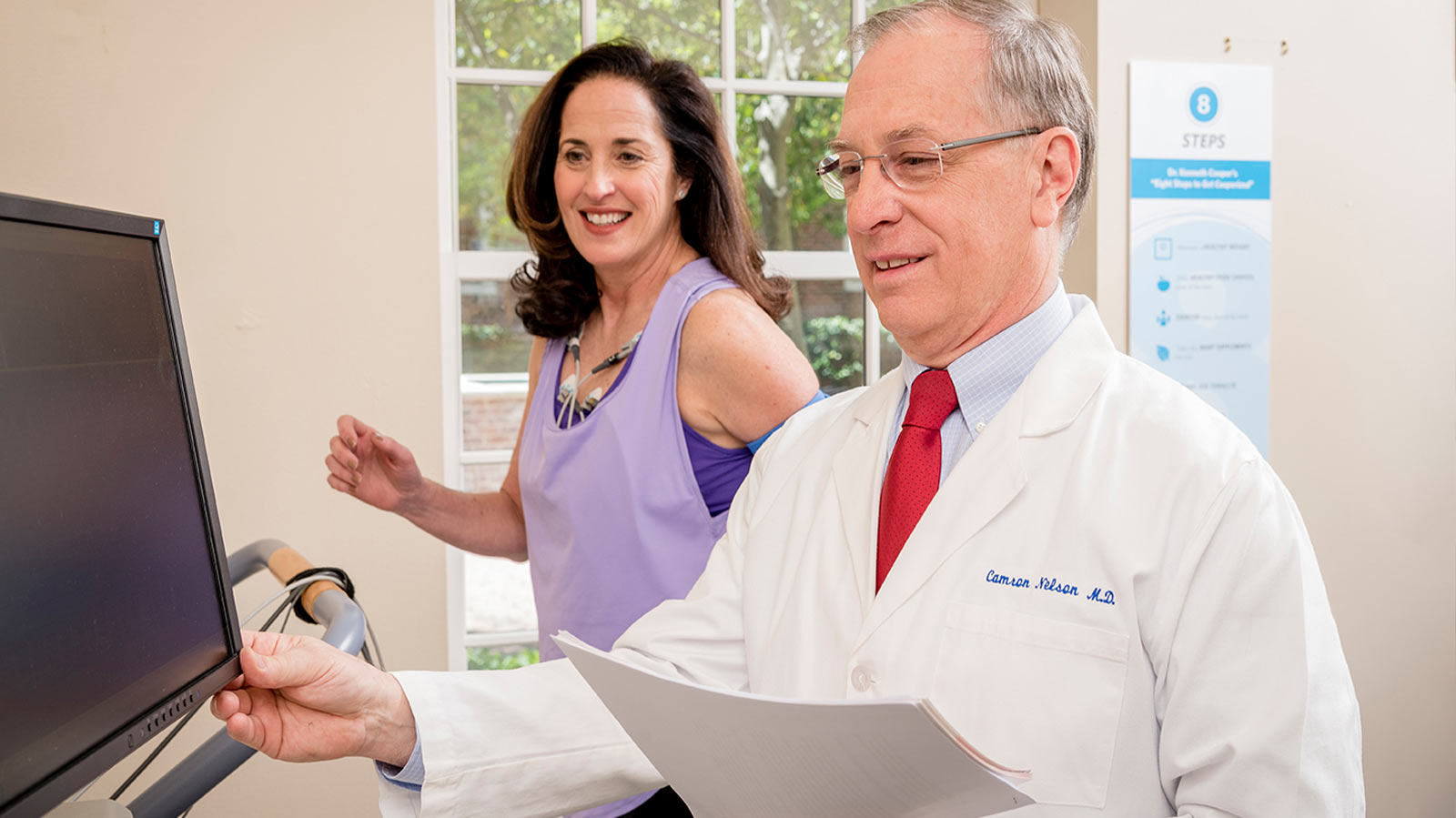 Cooper Aerobics Doctor testing a woman for her VO2 Max