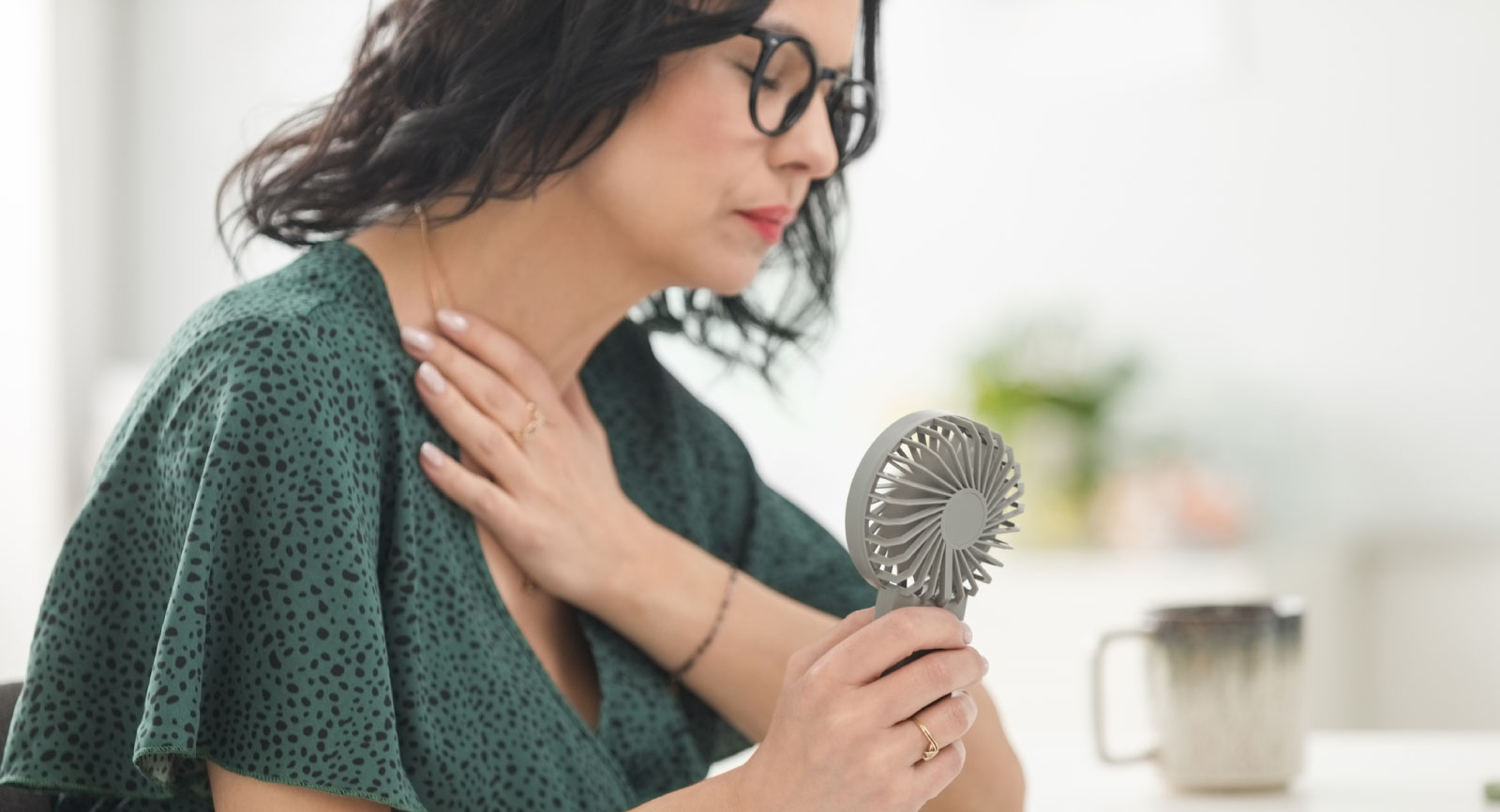 Women fanning herself