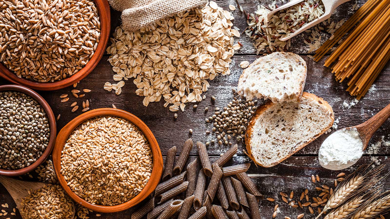 Different types of cereal grains with ears.