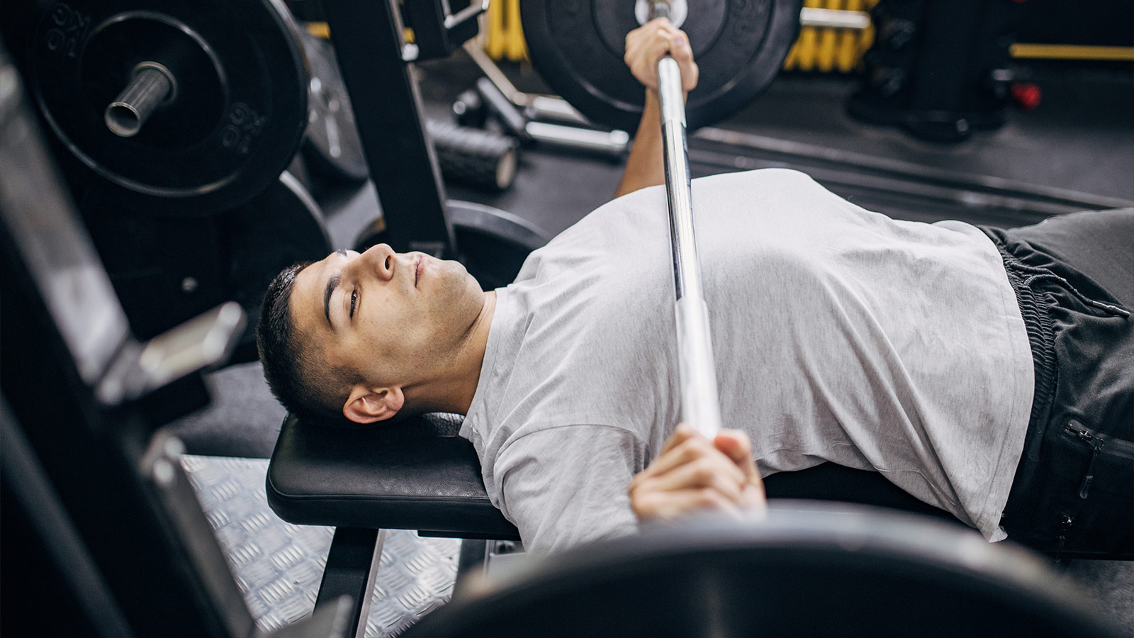A person bench pressing