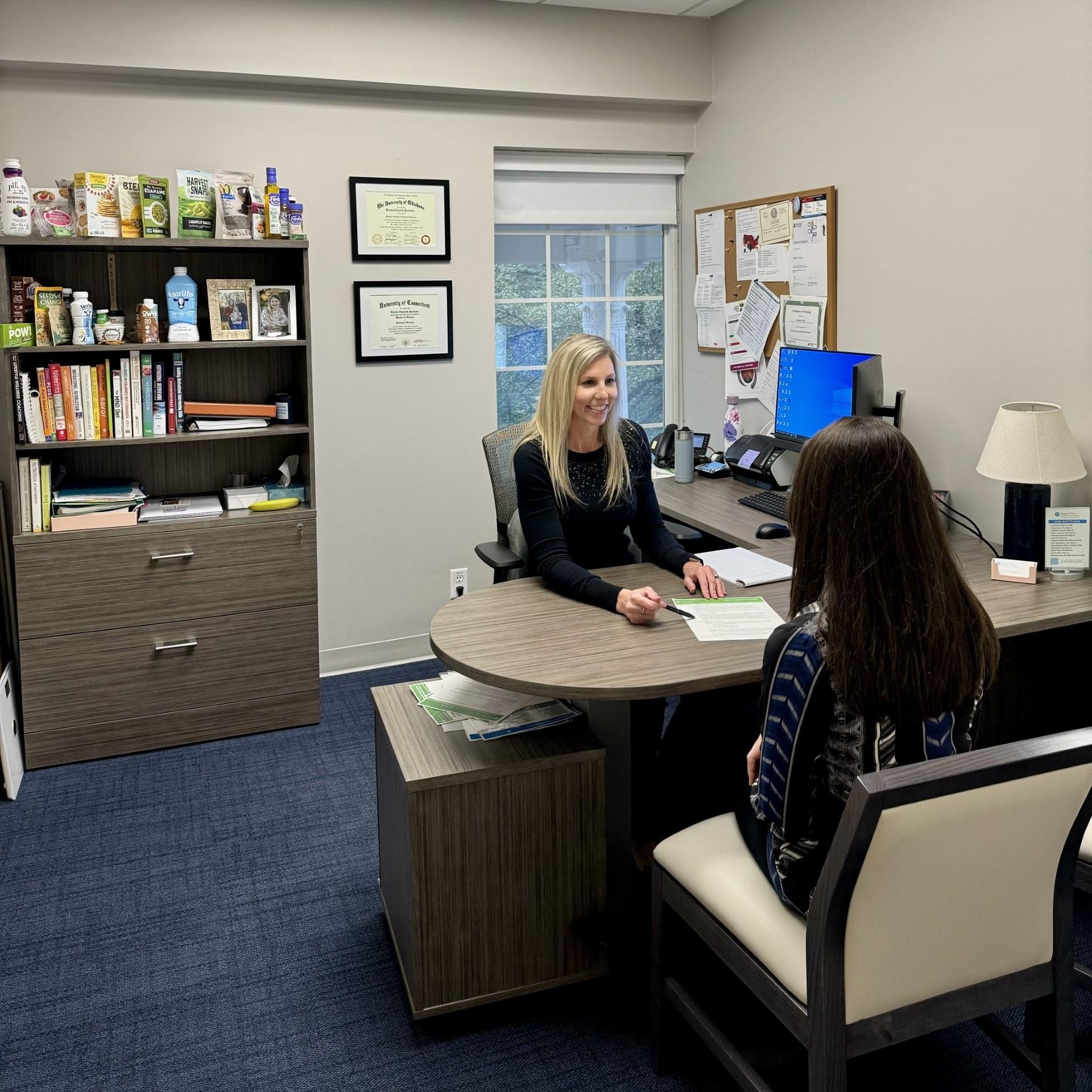 Kirstin Taylor, MS, RDN, LD with a patient