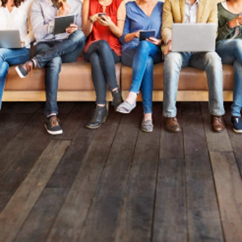 Group of people sitting on a couch