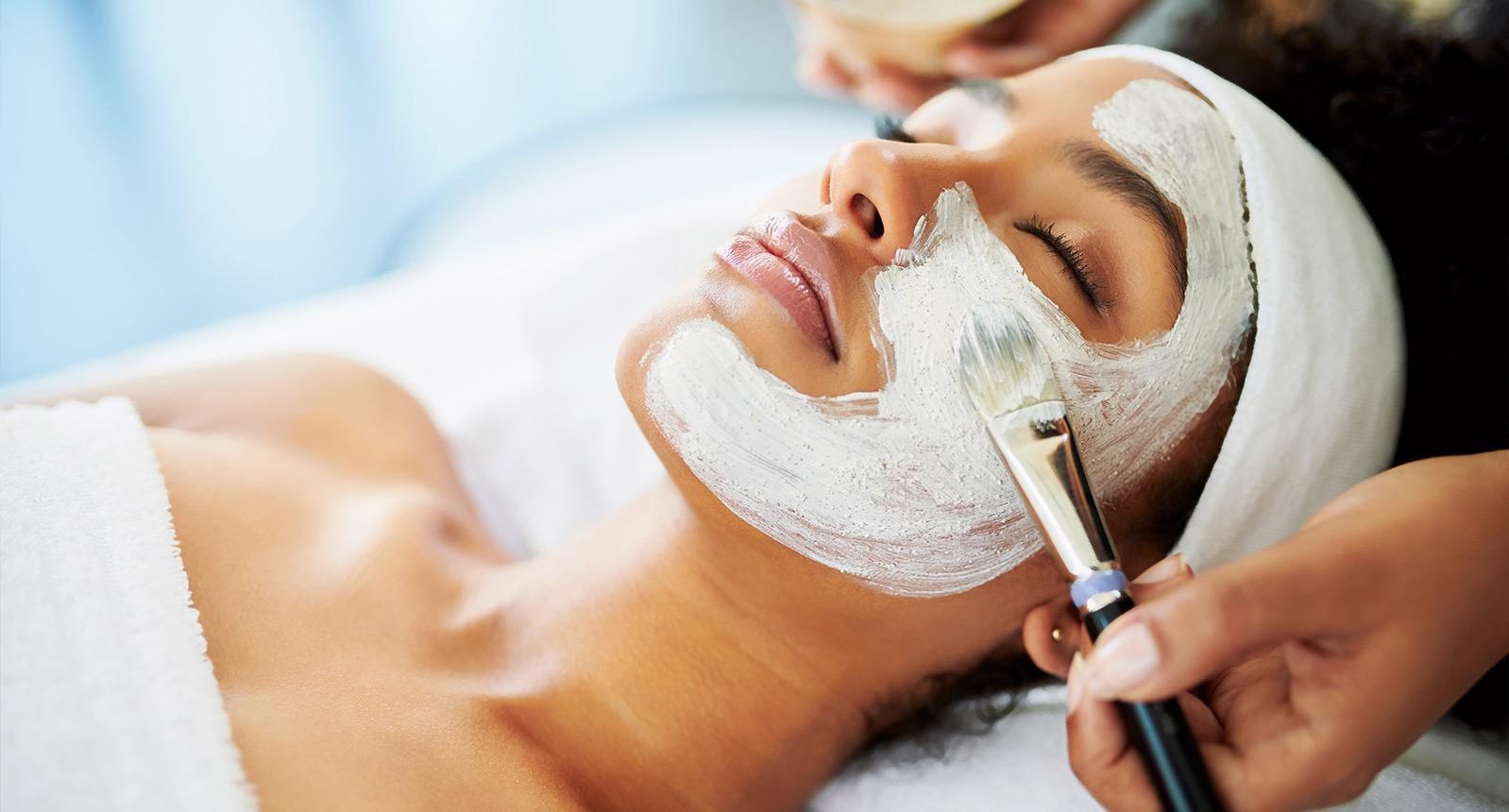 Shot of an attractive young woman getting a facial at a beauty spa