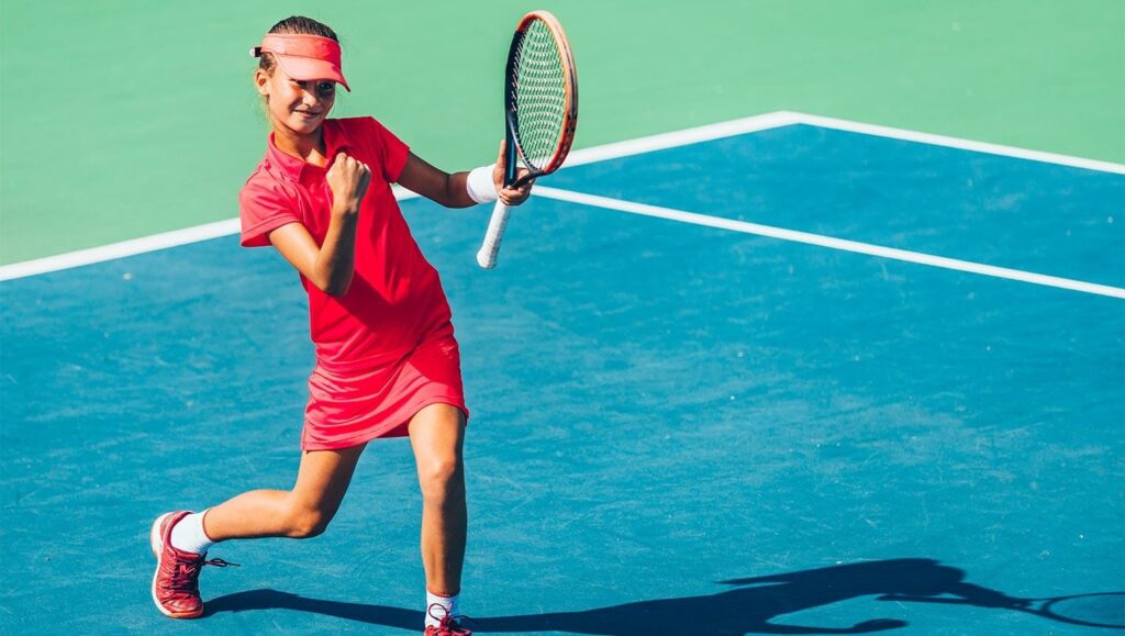 Youth tennis player celebrating