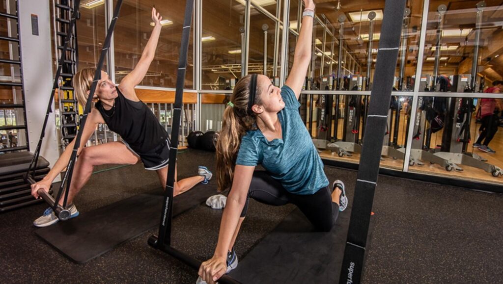 women stretching working out
